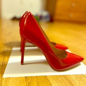 Red BCBG pumps, lightly worn